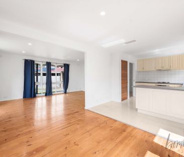 Spacious & Sunlit Living - Photo 1