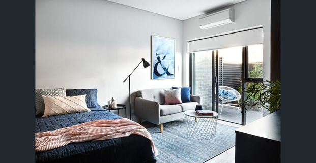 Stylish Studio Living with Courtyard Charm! - Photo 1