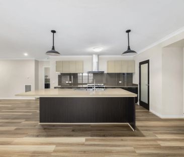 Modern Family Living in the Heart of Manor Lakes - Photo 4