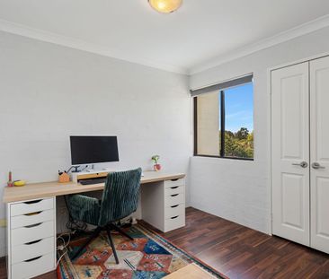 Top-Floor Living with Pool Views - Photo 6