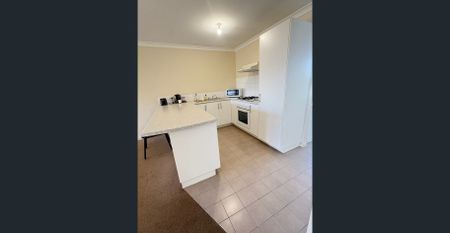 Tidy Unit in a Gated complex with sparkling pool! - Photo 5