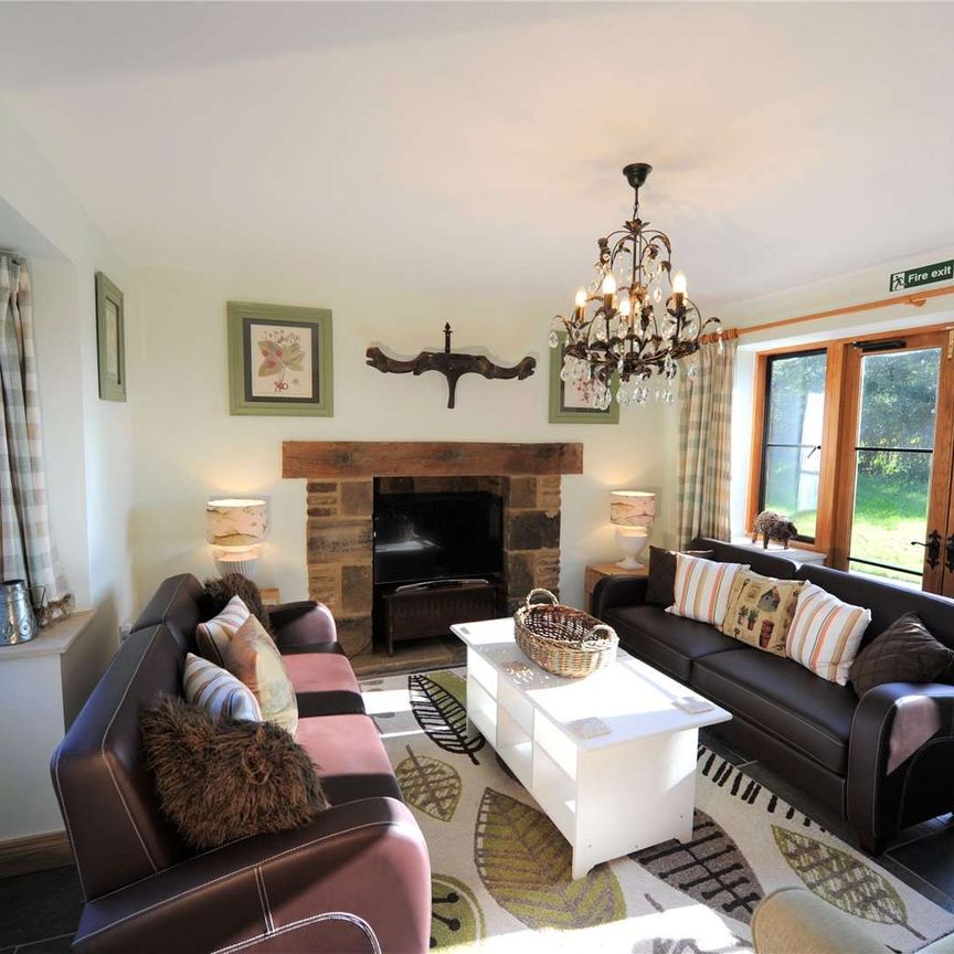 A charming and well presented family home benefitting from far reaching rural views. - Photo 1