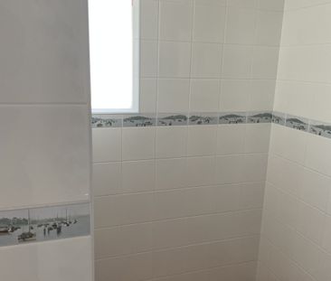 Modern, Accessible 3- Bedroom Home Minutes from the Water - Photo 1