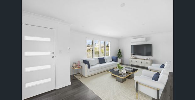 Modern Comfort Meets Entertainer's Delight: Stylish 3-Bedroom - Photo 1