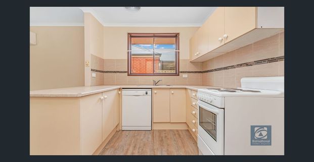 Low Maintenance Townhouse Living - Photo 1