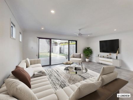 Modern Comfort Meets Coastal Charm: Renovated Family Home in Wynnum/Manly - Photo 4