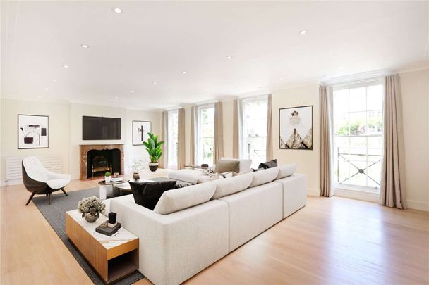 An unfurnished beautifully presented family house in Holland Park. - Photo 1