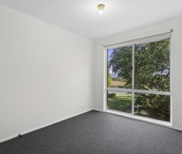 Comfortable & Well-Laid-Out 3-Bedroom Home with Versatile Living Sp... - Photo 4