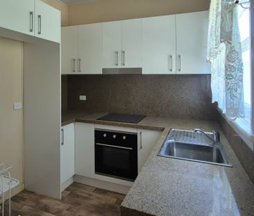 Clean Low Maintenance Unit Close to Town - Photo 4