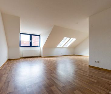 Charmante 3-Zimmer-Dachgeschosswohnung im Herzen der City - Foto 1
