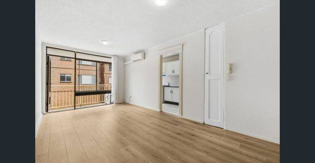 Two Bedroom Unit at fantastic location! - Photo 1