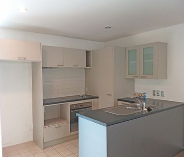 Townhouse Living in fully gated complex with 2 carparks - Photo 1