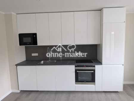 Erstbezug! Stilvolle 2-Zi KfW Neubauwohnung in Toplage von Rüdesheim mit Aufzug - Foto 3