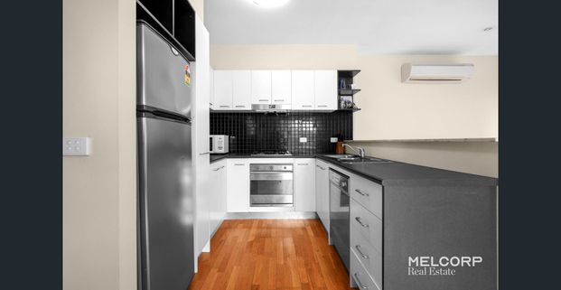 CORNER LOFT-STYLE APARTMENT WITH VIEWS FURNISHED - Photo 1