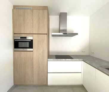 GELIJKVLOERS APPARTEMENT MET 2 SLPK EN ZUID-OOST TERRAS - Photo 1