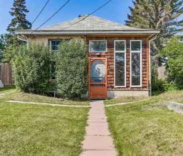 Cozy House in Trendy Highland Park | 134 32 Avenue Northeast, Calgary - Photo 1