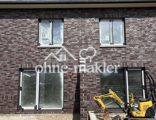 Doppelhaushälfte in Hammah - Photo 1