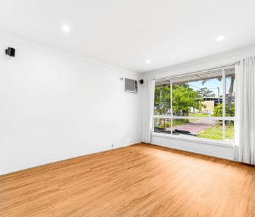 COMFORTABLE HOME IN GREAT LOCATION - Photo 1