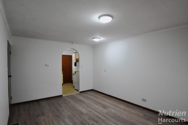 Two Bedroom Unit in an Ideal Location - Photo 1