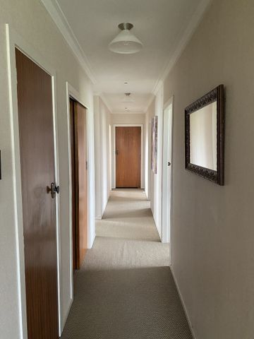 Situated in the desirable Cambridge and positioned perfectly over looking the Milan Park horse stud sits this immaculately presented four bedroom family home. - Photo 4