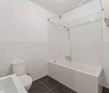 Gelijkvloers appartement met 1 à 2 slaapkamers, tuintje en garagebox - Photo 4