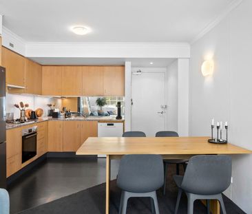 Bright & Spacious Split-Level Apartment Filled with Natural Light - Photo 4