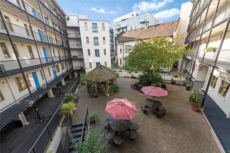 This conversion of a 1930's Seaman's Mission features an attractive tranquil courtyard garden including a residents BBQ area as well as a large roof terrace offering panoramic views. - Photo 5