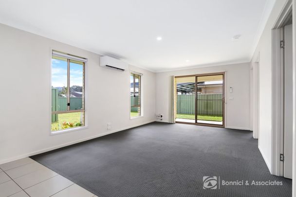 COMFORTABLE TWO-BEDROOM HOME WITH SECURE PRIVATE YARD - Photo 1