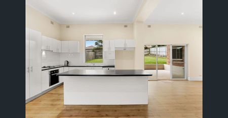 Classic Charm Meets Modern Living: 4-Bed Federation on Spacious Block - Photo 3