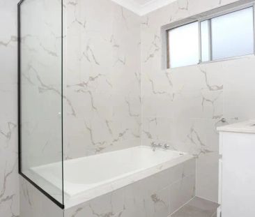 Charming Family Home in Coombabah - Photo 4