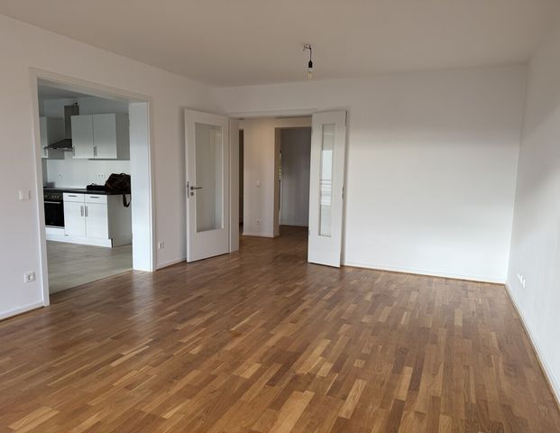 Moderne 3-Zimmer-Wohnung mit großen überdachten Balkon, in den Wannenseegärten - Foto 1