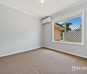 LOW MAINTENANCE, AIR-CONDITIONED AND IN LOGANDALE! - Photo 3