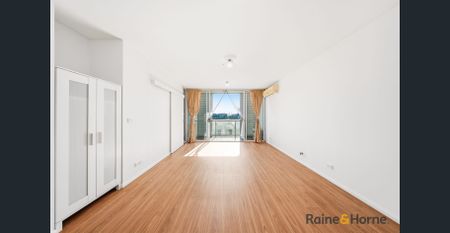 Spacious Dual-Level 2 Bed Apartment with Water Views & Resort-Style Facilities - Photo 2