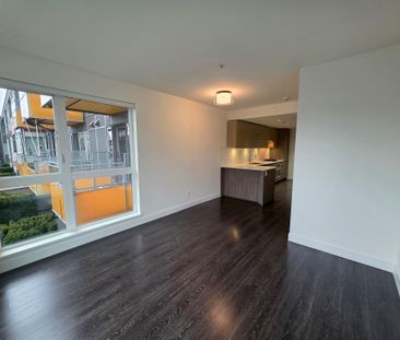 Stylish One Bedroom + Den Residence with Private Balcony - Photo 1