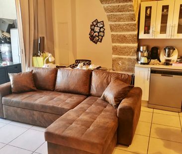 APPARTEMENT T3 EN DUPLEX AVEC COUR ET STATIONNEMENT - Photo 1