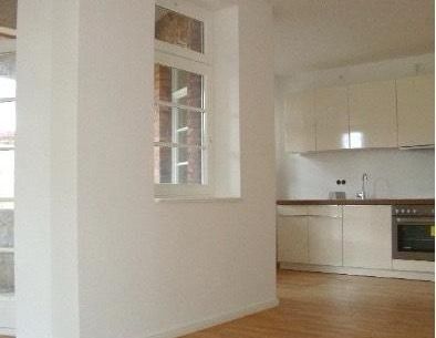 Sanierte 2-Raum-Wohnung mit Balkon, Terrasse und Einbauküche - Foto 1