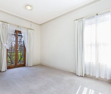 Top-Floor Living with Park Views & Incredible Convenience - Photo 5