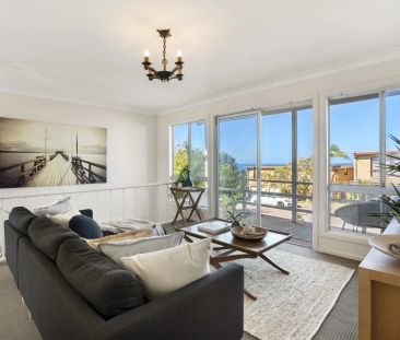 Beachside Living in a Dual Level Home - Photo 1