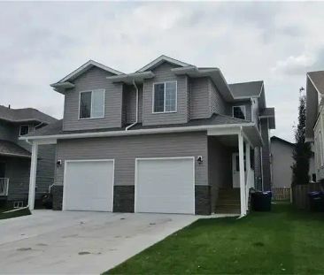 4 bedroom House in Olds | Olds - Photo 1