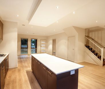 Modern Townhouse in Prime Woodend Location - Photo 1