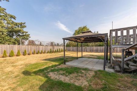 Upper Home with Large Fenced Yard - Photo 3