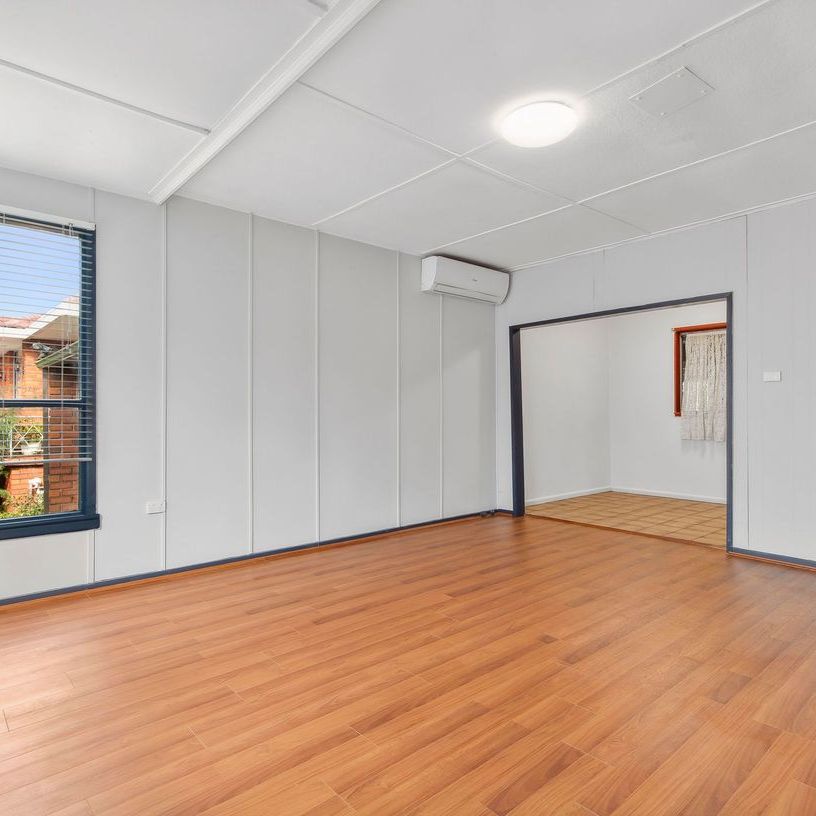 PERFECTLY SITUATED FAMILY HOME - Photo 1