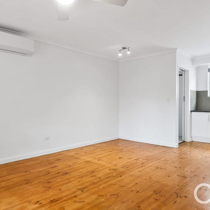 Open the Door to Comfort and Convenience in a Prime Location - Photo 1