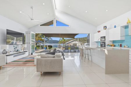 Sublime Deep Waterfront Home with Jetty & Boatshed/Games Room Fully Furnished - Photo 3