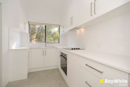 Beautifully Renovated 2 Bedroom Unit - Photo 2
