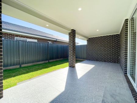 CORNER HOUSE: 4 BEDROOM, 2.5 BATHROOM, 2 CAR GARAGE, PLUS BONUS THEATRE/HOME OFFICE - Photo 2