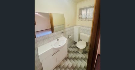 Spacious Family Living with Huge Shed & Renovated Kitchen - Photo 5