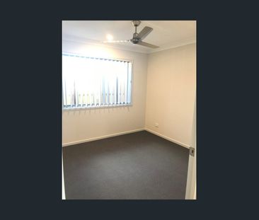 Spacious 4-Bedroom Low-Set Home in a Convenient Location - Photo 1