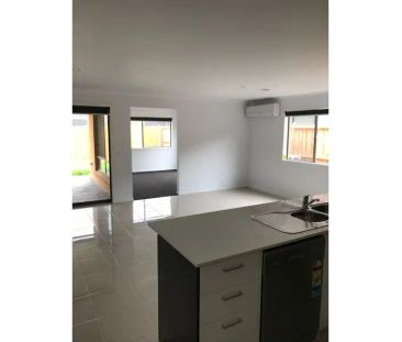 “4 BEDROOM HOME WITH 2 LIVING SPACES!” - Photo 1