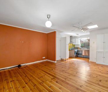 Low maintenance living in popular locale - Photo 1